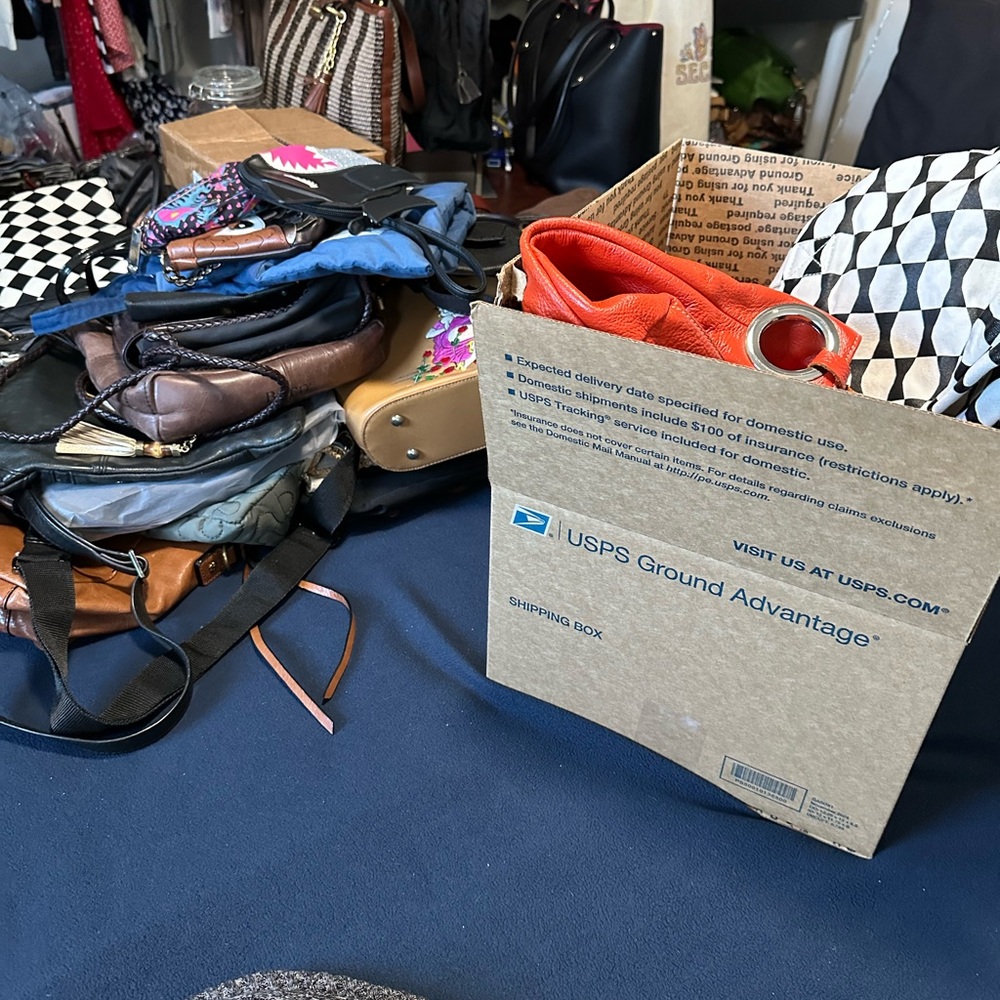 Box of bags and or wallets - as is! as shown In live